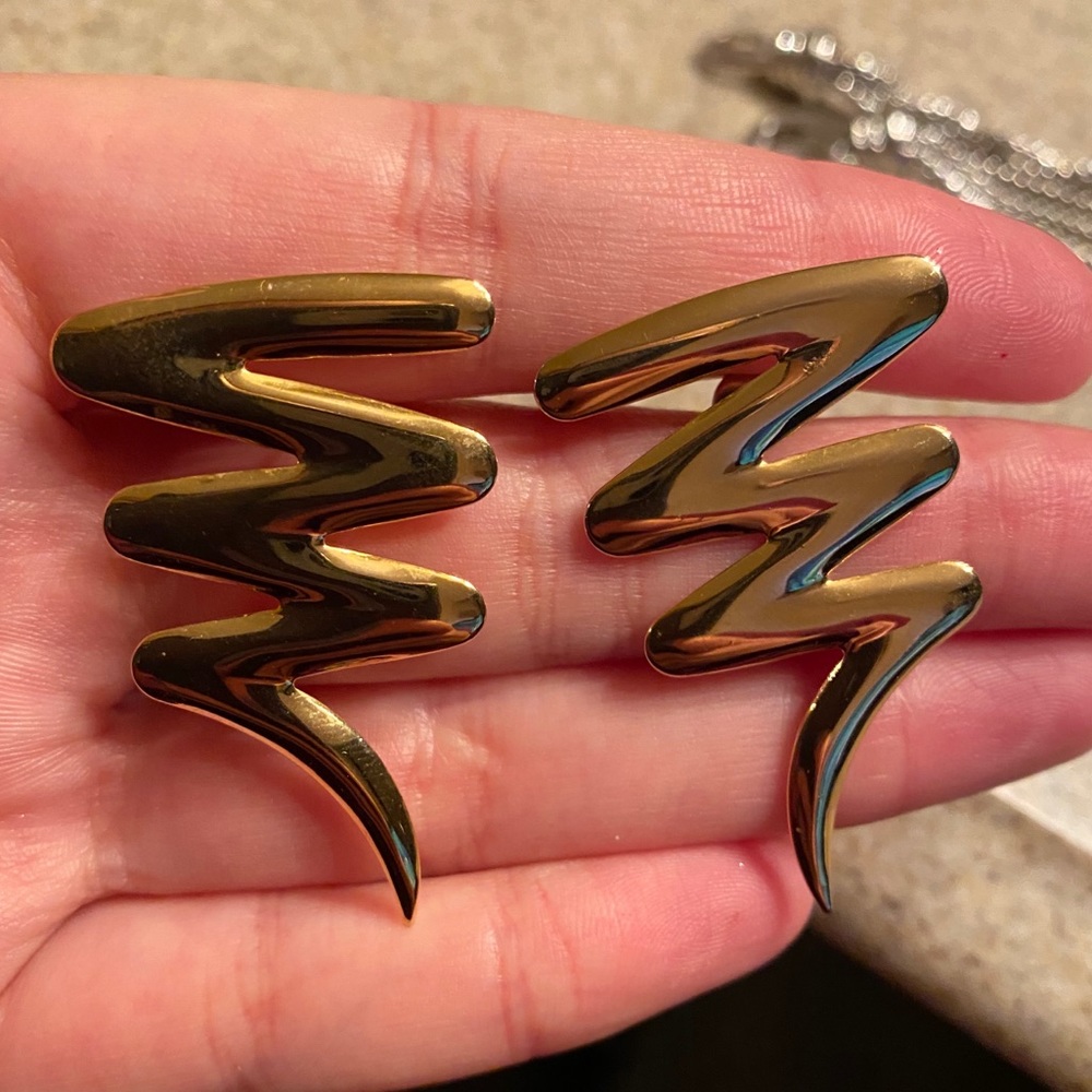 Gold colored squiggle line earrings